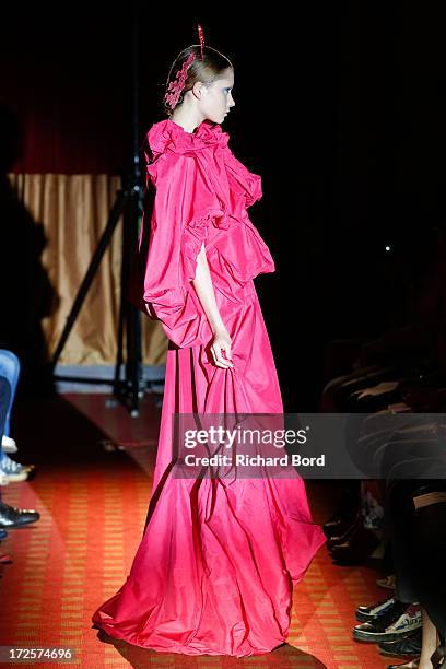 Model walks the runway during the Yoshiki Hishinuma Couture show as part of Paris Fashion Week Haute-Couture Fall/Winter 2013-2014 at Hotel Lutetia...