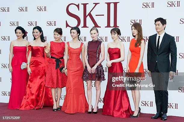 Actors Susan Bachtiar, Suquan Bulakul, Kim Hee-Ae, Tang Wei, Kate Bosworth, Lim Soo-Jung, Lee Yeon-Hee and Yoo Ji-Tae pose for the photogrpahs during...