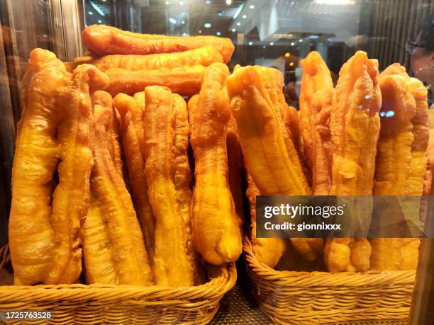 youtiao, mong kok, kowloon - youtiao stock pictures, royalty-free photos & images