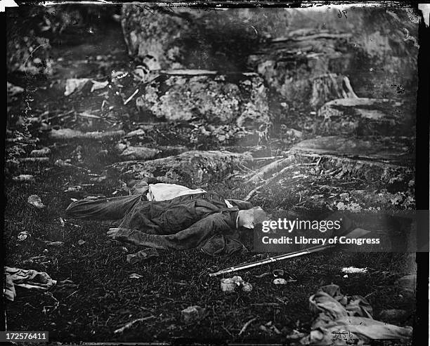 Dead Confederate sharpshooter in Devil's Den during the Battle of Gettysburg, Pennsylvania, July 1863. Photograph by Alexander Gardner.