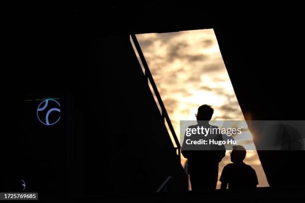 Spectators get in the court during the match Rajeev Ram of the United States and Joe Salisbury of Great Britain against Alexei Popyrin and Aleksandar...