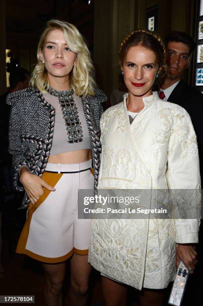 Elena Perminova and Eugenie Niarchosi attend the Valentino show as part of Paris Fashion Week Haute-Couture Fall/Winter 2013-2014 at Hotel Salomon de...