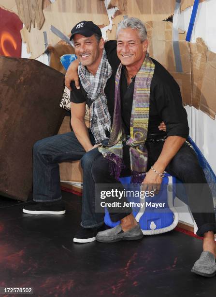Diver/Actor Greg Louganis and Johnny Chaillot arrive at the 'This Is The End' - Los Angeles Premiere at Regency Village Theatre on June 3, 2013 in...
