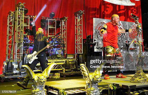 Ivan Moody and Chris Kael of Five Finger Death Punch perform at the Rockstar Energy Drink Mayhem Festival on June 30, 2013 in San Francisco,...