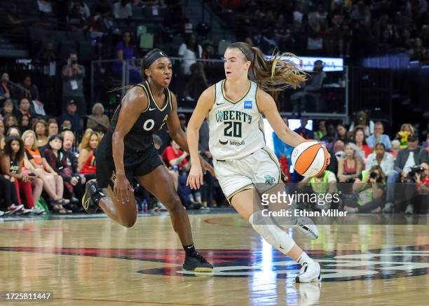 Sabrina Ionescu of the New York Liberty drives against Jackie Young of the Las Vegas Aces in the third quarter of Game One of the 2023 WNBA Playoffs...