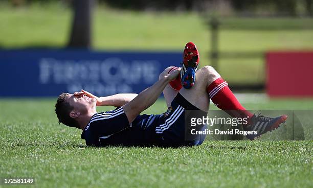 Brian O'Driscoll stretches during a British and Irish Lions training session at Noosa Dolphins RFA on July 4, 2013 in Noosa, Australia.