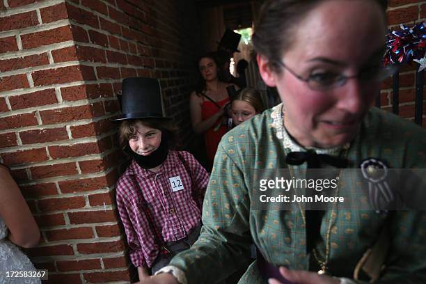 Contestants take part in an Abraham Lincoln look-alike contest on the 150th anniversary of the historic Battle of Gettysburg on July 3, 2013 in...
