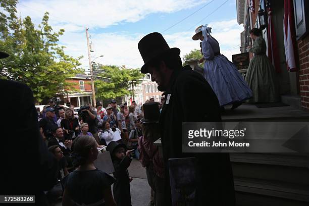 Contestants take part in an Abraham Lincoln look-alike contest on the 150th anniversary of the historic Battle of Gettysburg on July 3, 2013 in...