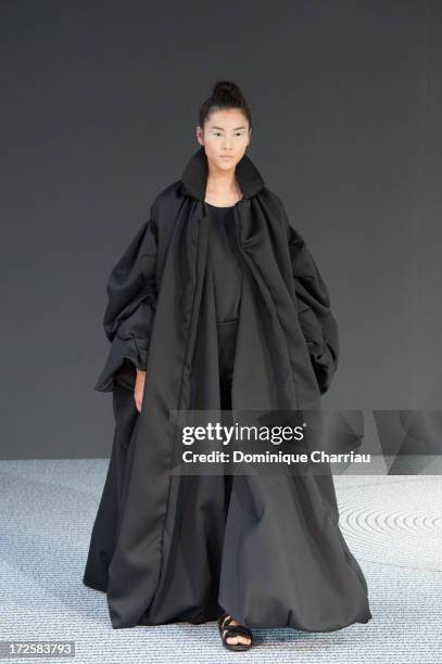 Model walks the runway during the Viktor&Rolf show as part of Paris Fashion Week Haute-Couture Fall/Winter 2013-2014 at La Gaite Lyrique on July 3,...