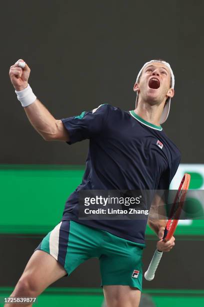 Diego Schwartzman of Argentina celebrates after winning in the Men's Singles Round of 32 match against Taylor Fritz of the United States on Day 8 of...