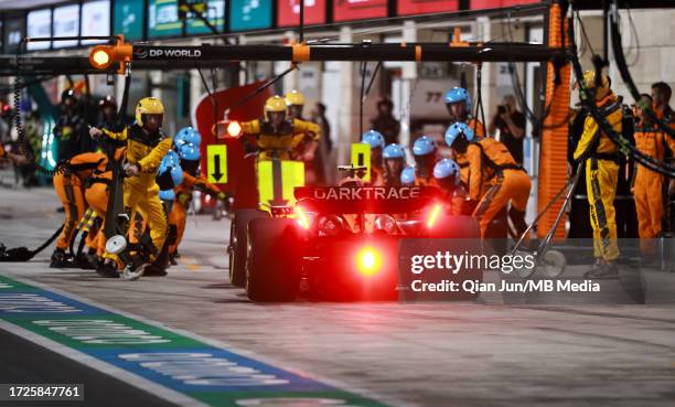 Lando Norris of Great Britain pits the McLaren MCL60 Mercedes during the F1 Grand Prix of Qatar at Lusail International Circuit on October 8, 2023 in...