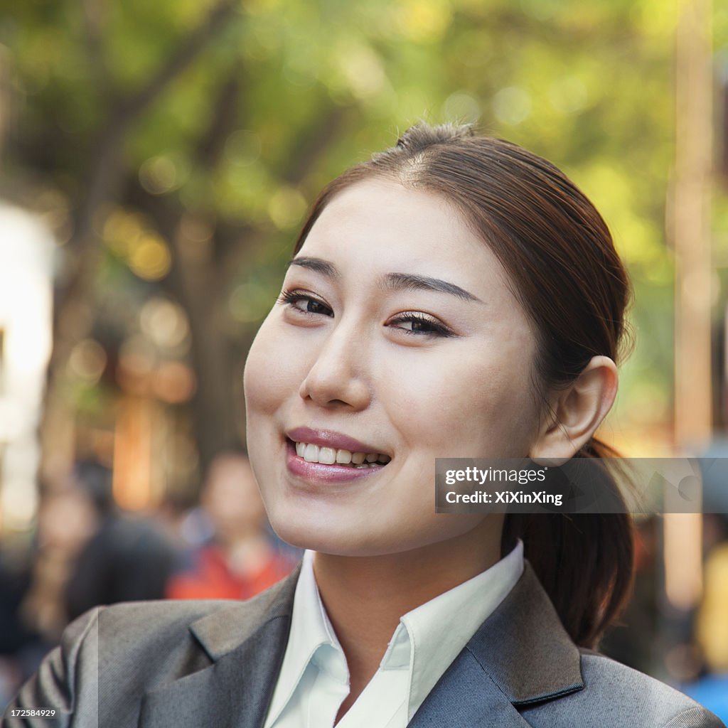 Portrait of young business woman in Houhai, Beijing, China