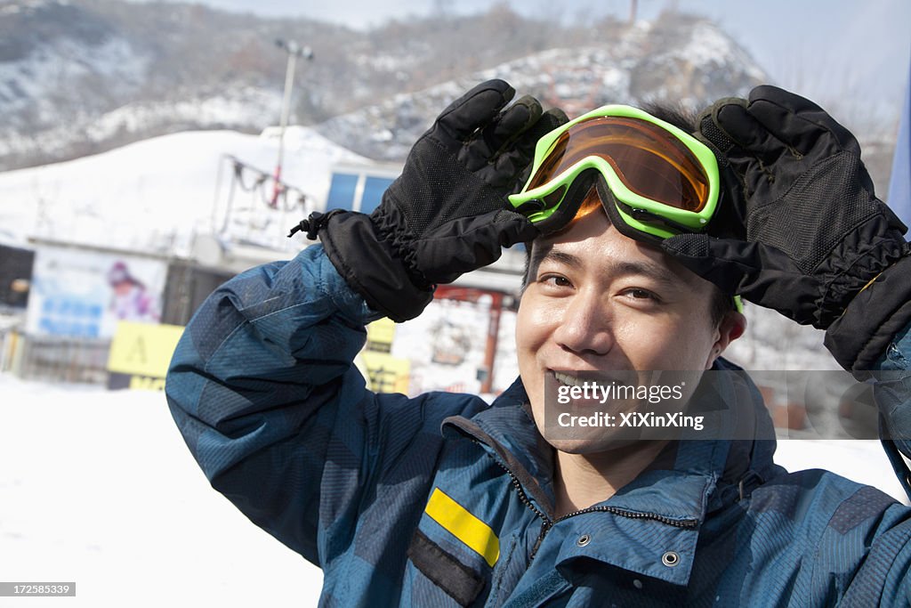 Smiling Man in Ski Resort