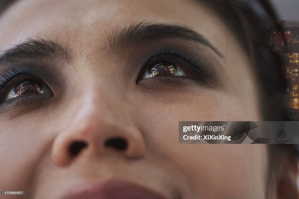 Young Woman with Smoky Eyes Close-Up