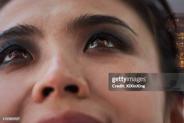 young woman with smoky eyes close-up - emotion foto e immagini stock