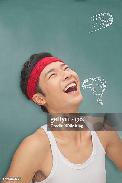 young athletic man in front of blackboard with drawings - whistle blackboard stock pictures, royalty-free photos & images