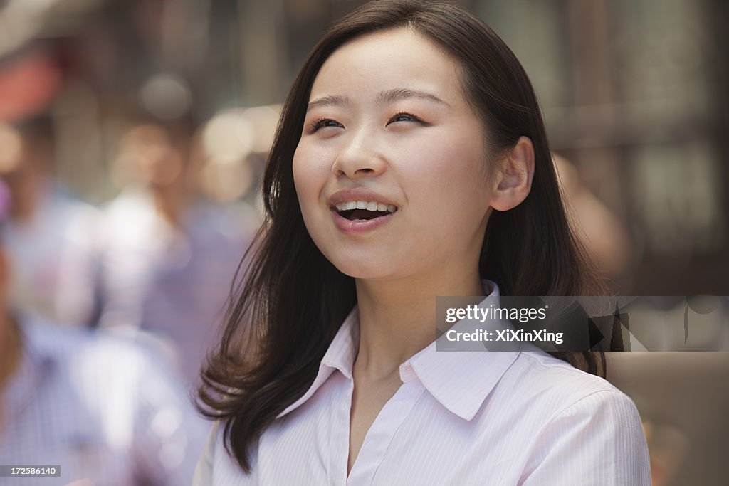 Portrait of happy young women on the street, Beijing