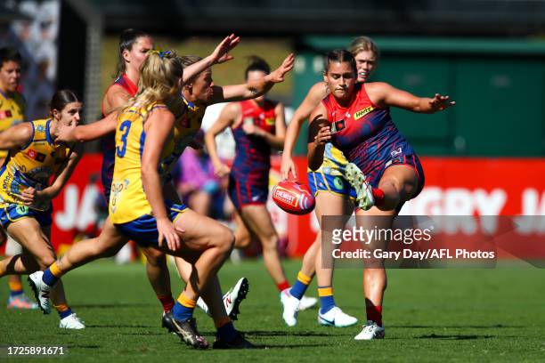 Eliza West of the Demons kicks the ball during the 2023 AFLW Round 07 match between the West Coast Eagles and Naarm at Mineral Resources Park on...