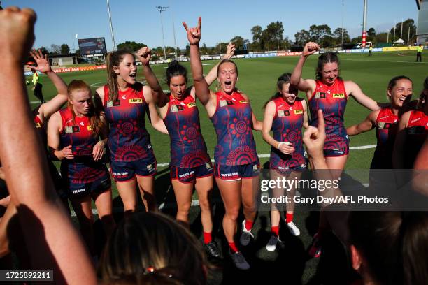 Naarm sing the team song during the 2023 AFLW Round 07 match between the West Coast Eagles and Naarm at Mineral Resources Park on October 14, 2023 in...