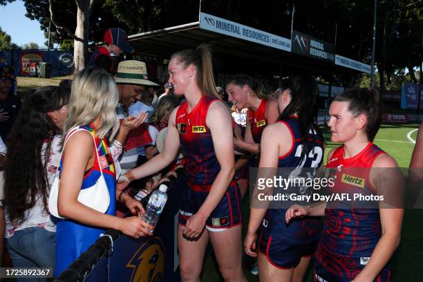 Naarm players celebrate with fans during the 2023 AFLW Round 07 match between the West Coast Eagles and Naarm at Mineral Resources Park on October...