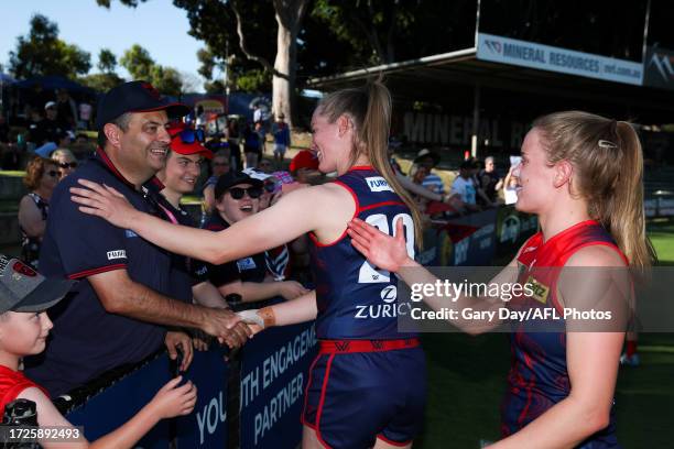 Eden Zanker and Sarah Lampard of the Demons celebrate with fans during the 2023 AFLW Round 07 match between the West Coast Eagles and Naarm at...