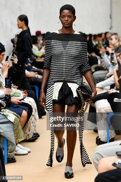 Model walks the runway during the Kiko Kostadinov Ready to Wear Spring/Summer 2024 fashion show as part of the Paris Fashion Week on October 3, 2023...