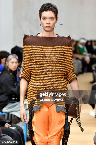 Model walks the runway during the Kiko Kostadinov Ready to Wear Spring/Summer 2024 fashion show as part of the Paris Fashion Week on October 3, 2023...