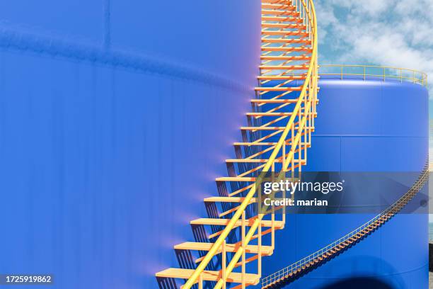 stairs for large oil storage tanks - industrial style stock pictures, royalty-free photos & images