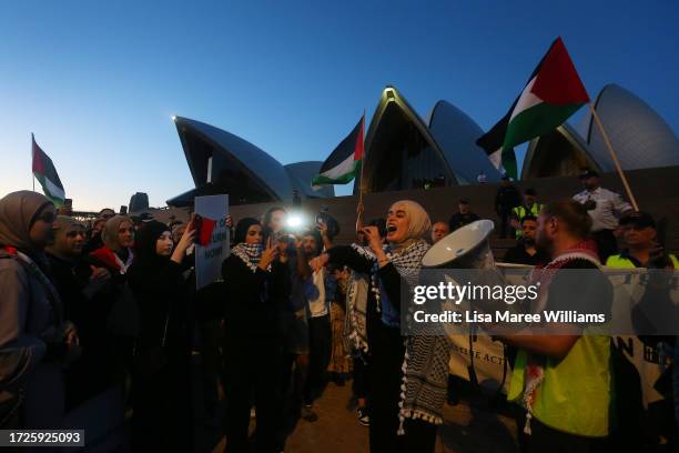 Palestine supporters rally outside the Sydney Opera House on October 09, 2023 in Sydney, Australia. The Palestinian militant group Hamas launched a...