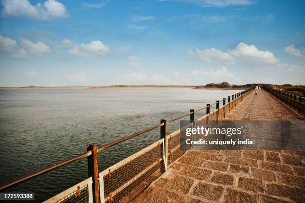 walkway along aji dam, aji river, rajkot, gujarat, india - aji river (gujarat) stock pictures, royalty-free photos & images