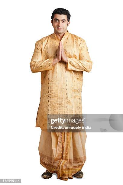 portrait of a man greeting - kurta stockfoto's en -beelden