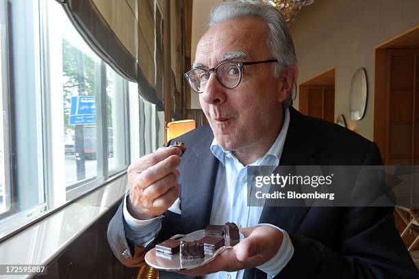 Chef Alain Ducasse samples his chocolates in London, U.K., on Tuesday, June 25, 2013. Ducasse says he almost became a chocolatier rather than a chef...