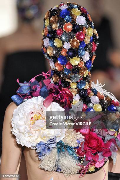 Model walks the runway during the Maison Martin Margiela show as part of Paris Fashion Week Haute-Couture Fall/Winter 2013-2014 on July 3, 2013 in...