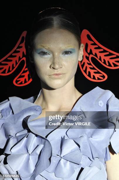 Model walks the runway during the Yoshiki Hishinuma Couture show as part of Paris Fashion Week Haute-Couture Fall/Winter 2013-2014 at the Hotel...