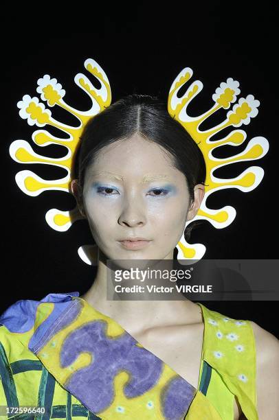 Model walks the runway during the Yoshiki Hishinuma Couture show as part of Paris Fashion Week Haute-Couture Fall/Winter 2013-2014 at the Hotel...
