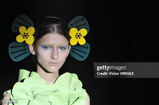 Model walks the runway during the Yoshiki Hishinuma Couture show as part of Paris Fashion Week Haute-Couture Fall/Winter 2013-2014 at the Hotel...