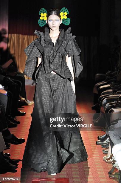 Model walks the runway during the Yoshiki Hishinuma Couture show as part of Paris Fashion Week Haute-Couture Fall/Winter 2013-2014 at the Hotel...