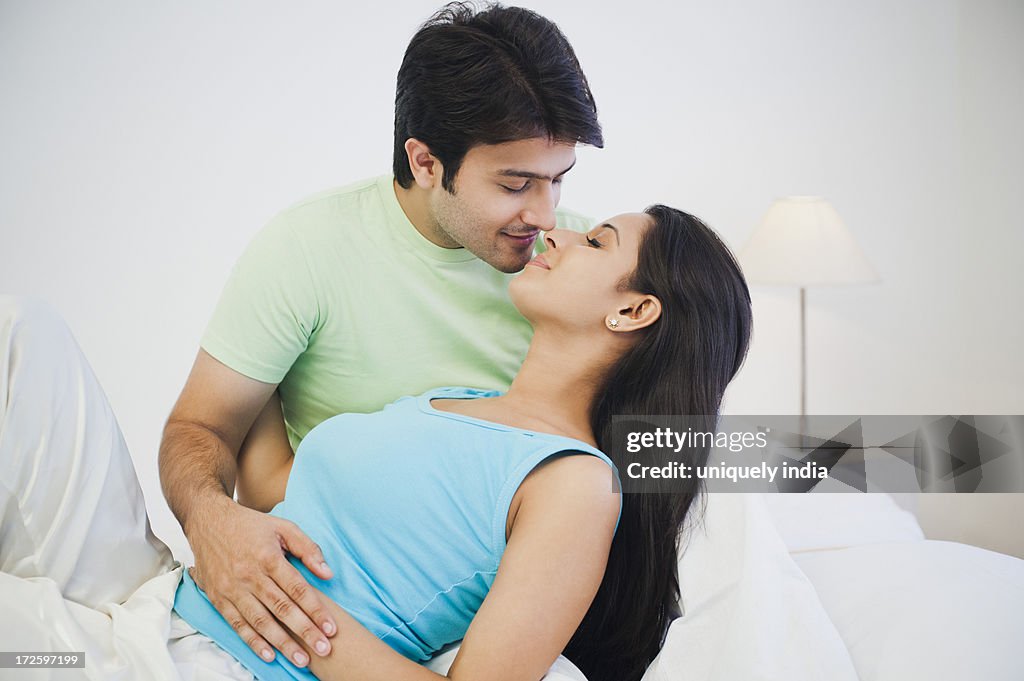 Romantic couple on the bed