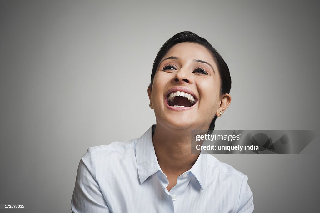 Close-up of a businesswoman laughing