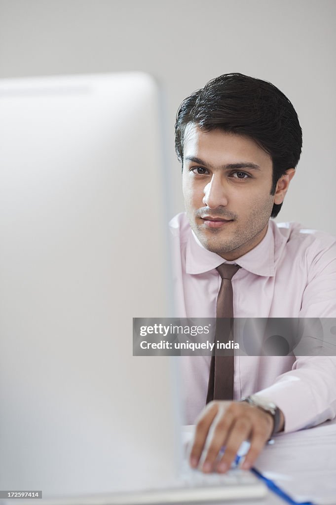 Portrait of a businessman working in an office