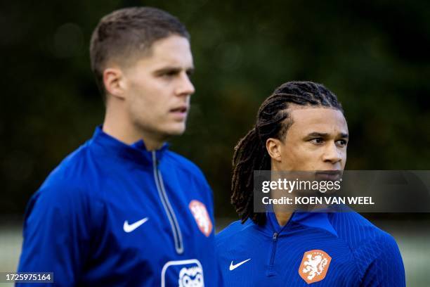 Netherland's Dutch midfielder Joey Veerman and Netherland's Dutch defender Nathan Ake take part during a training session of the Dutch national team...