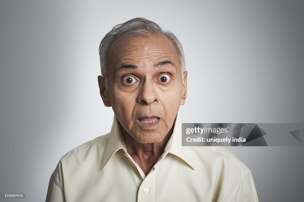Portrait of a man looking shocked