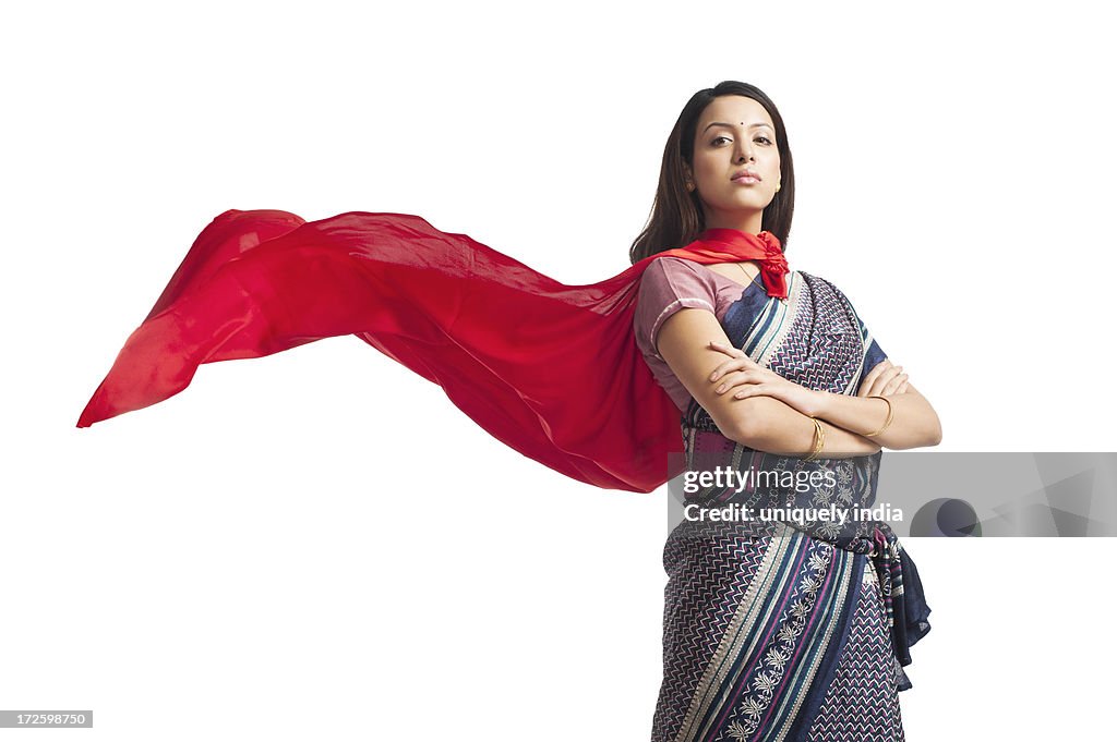 Portrait of a woman posing in superhero costume