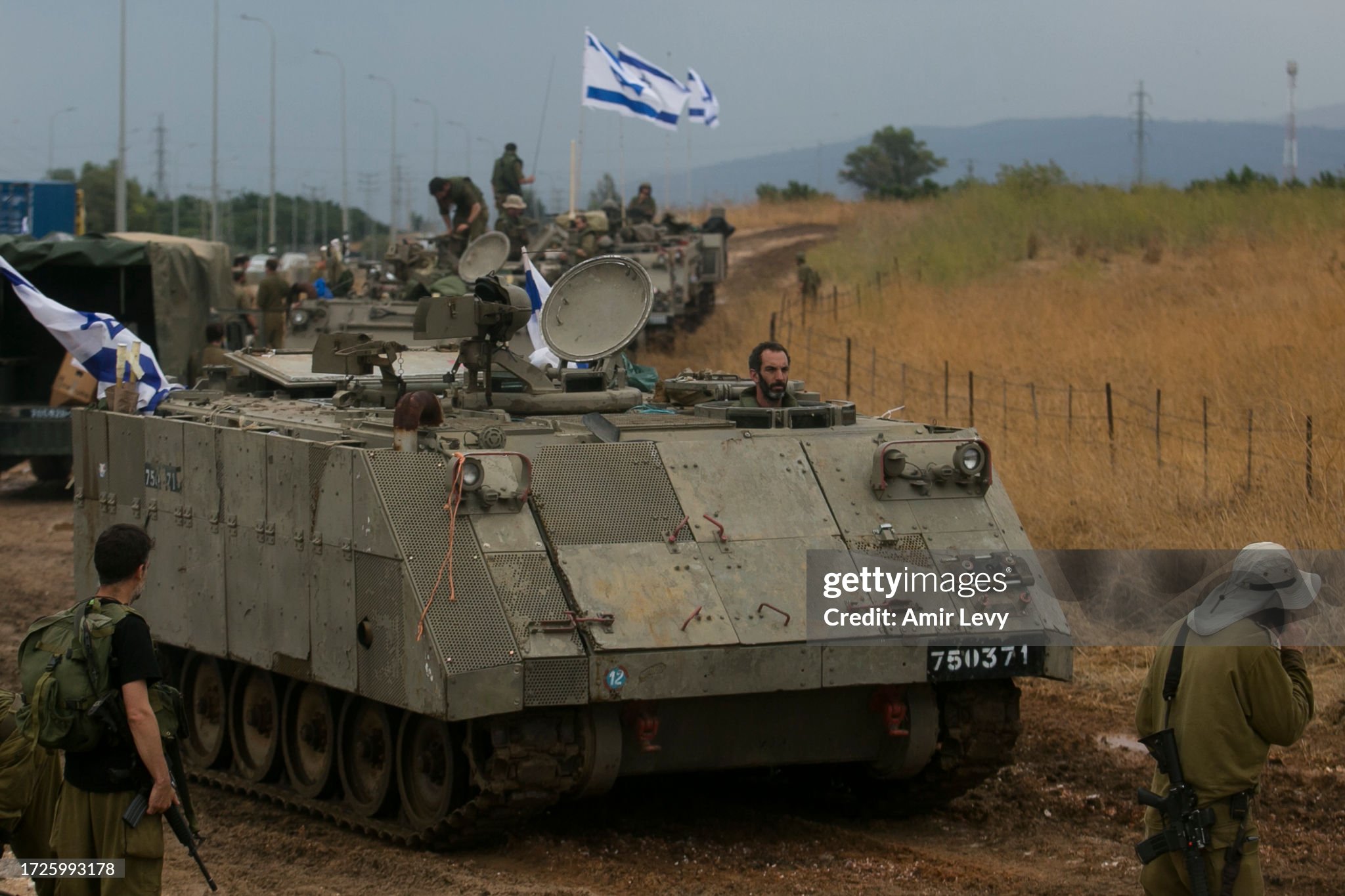 israeli-armor-personnel-carriers-move-in-formation-near-the-israeli-border-with-lebanon-on.jpg?s=2048x2048&w=gi&k=20&c=K1rnXvqxI8oJ8AbAg82n3TBZIIUwcAjSwAeDCzNw8Tc=