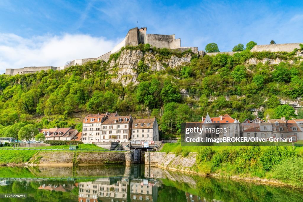 Houses at the foot of Mount Saint Etienne with the World Heritage Site of the Citadel of Besancon on the Doubs River, City of Besancon, Burgundy-Franche-Comte, France