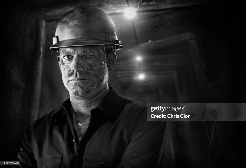 Caucasian carpenter wearing hard hat