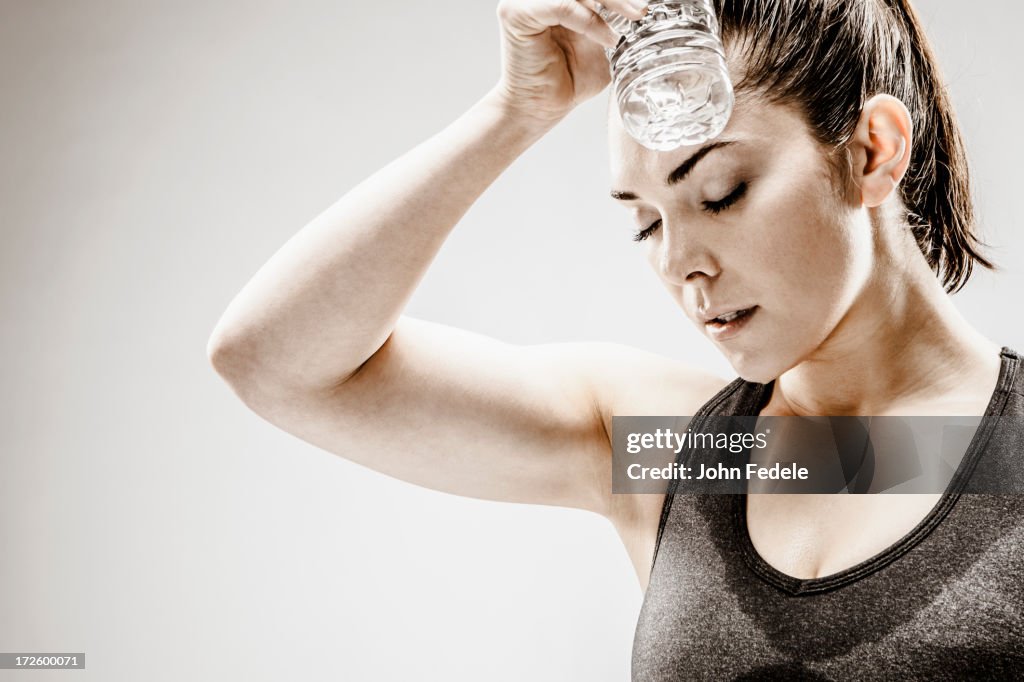Caucasian woman resting after workout