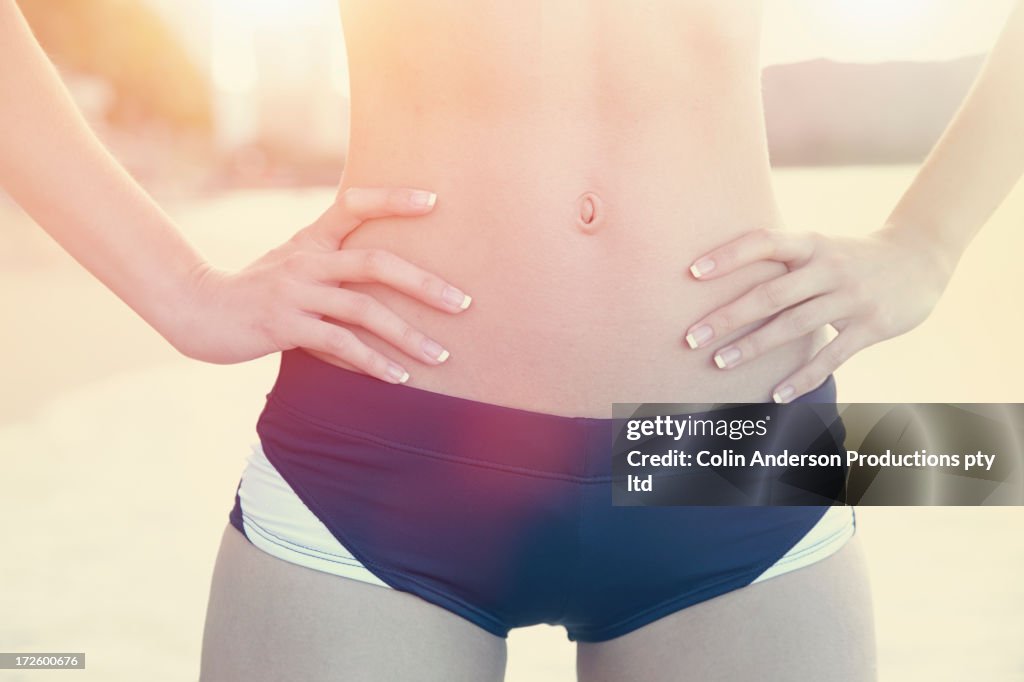 Pacific Islander woman wearing exercise gear