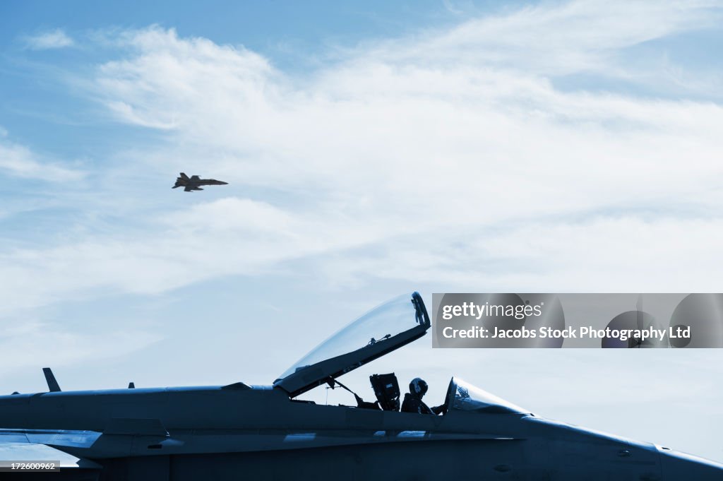 Fighter jets flying in sky