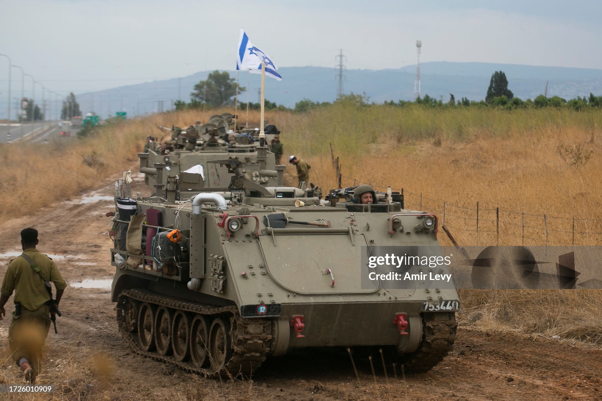israeli-armor-personnel-carriers-move-in-formation-near-the-israeli-border-with-lebanon-on.jpg?s=2048x2048&w=gi&k=20&c=ZXmUA2Ntn-qA1SFgnVuvHtYdCy1gF28NaMHEWEUrgLk=
